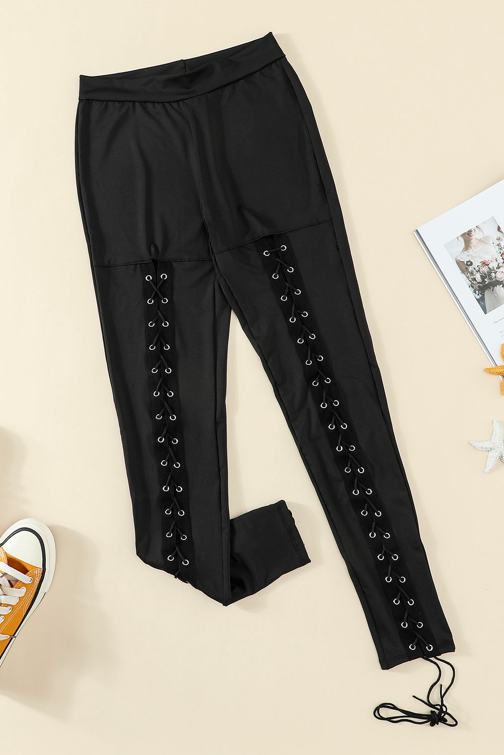 Leggings delanteros con cordones y ojales negros