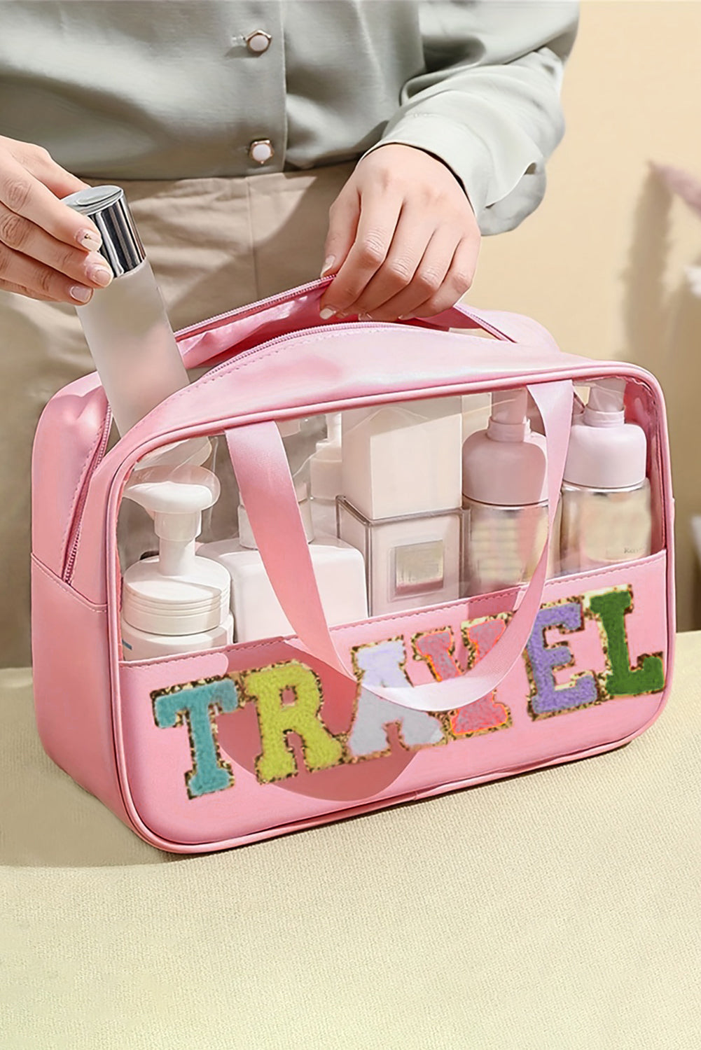 Bolsa de maquillaje de PVC transparente con letras de chenilla de viaje rosa claro