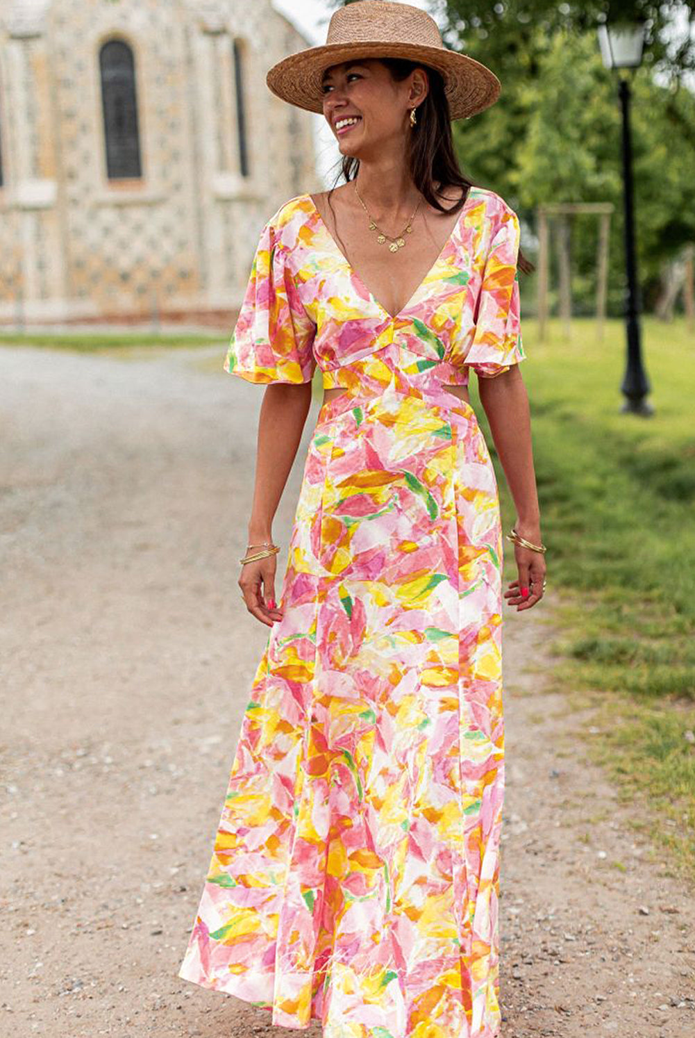 Vestido largo bohemio con estampado floral y mangas acampanadas rosa