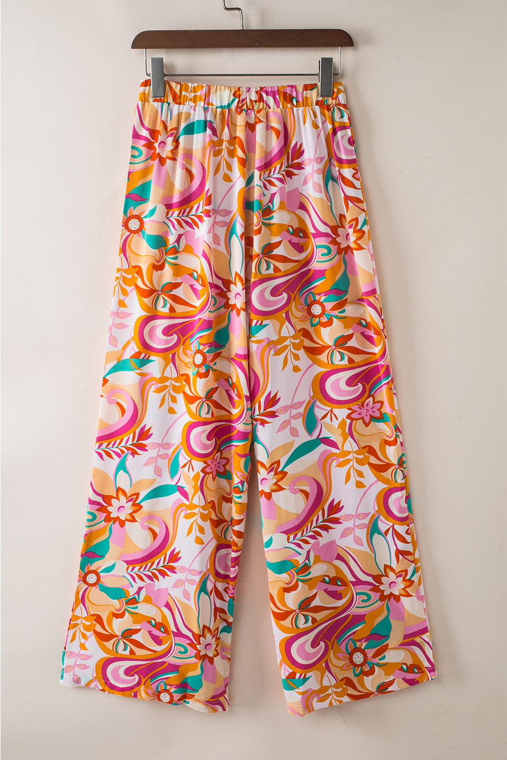 Pantalones anchos con estampado floral naranja